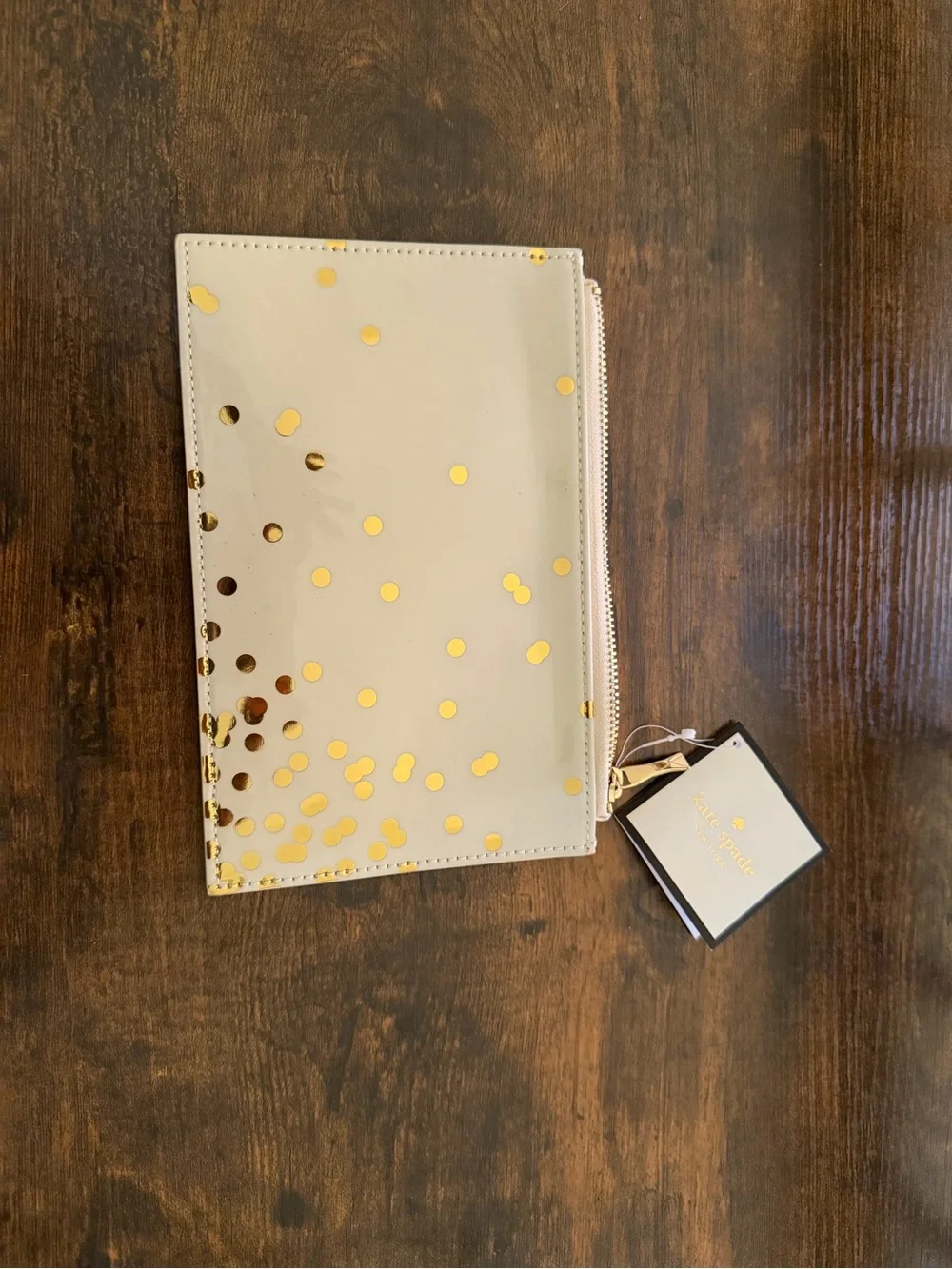 kate spade beige patent pouch with metallic gold polka dots